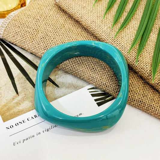 Bracelet en résine bleu-vert